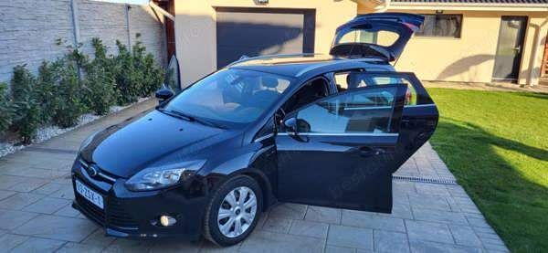 Negru Utilizat 2014 Ford Focus Titanium X Break | 4.999 EUR (Preț bun) - Imagine 1/4