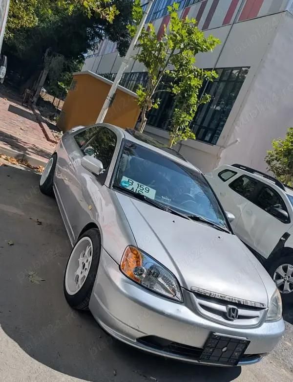 Second-hand Honda Civic 125 CP (91 kW) 2002 Argintiu Coupe