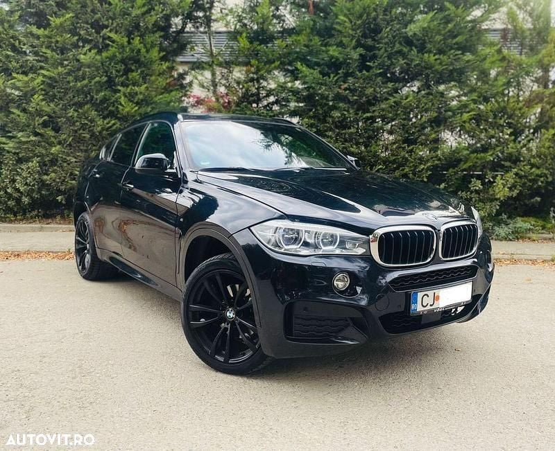 Culoarenegru Utilizat 2019 BMW X6 SUV | 32.290 EUR (Super Preț) - Imagine 1/4