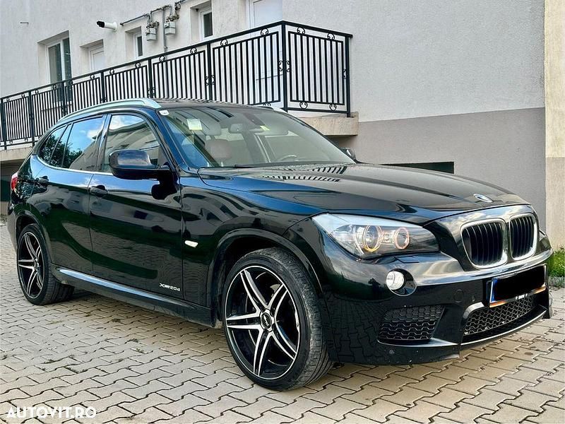 Culoarenegru Utilizat 2011 BMW X1 M Sport SUV | 8.700 EUR (Preț bun) - Imagine 1/4