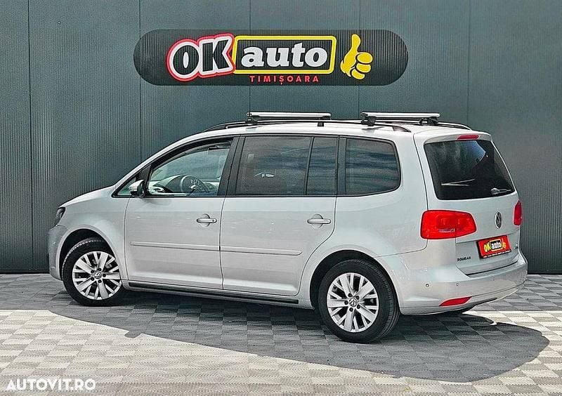 Second-hand VW Touran 105 CP (77 kW) 2013 Culoareargint Monovolum