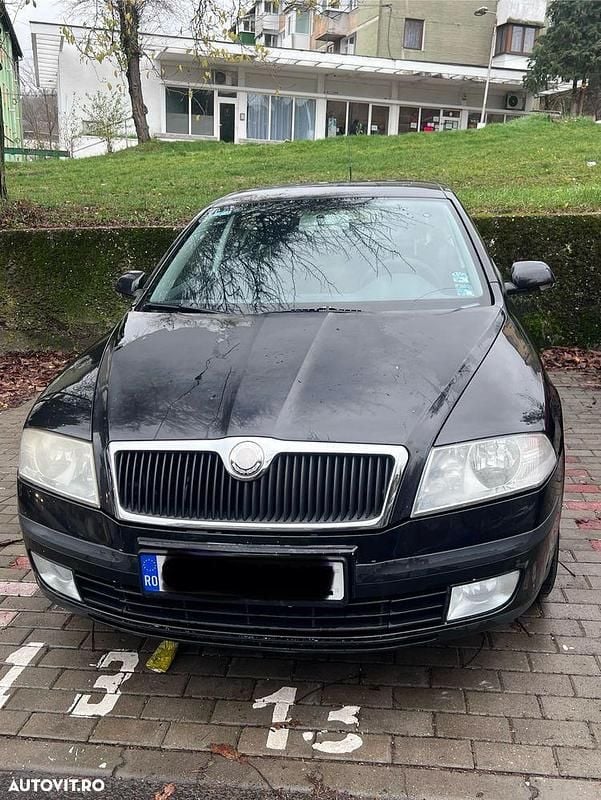 Negru Utilizat 2008 Skoda Octavia Classic Berlinǎ | 2.500 EUR (Preț bun) - Imagine 1/4