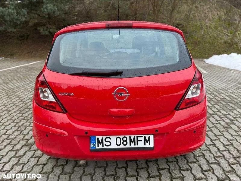 Second-hand Opel Corsa Edition 90 CP (66 kW) 2009 Culoarerosu Hatchback