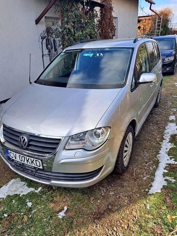 Second-hand VW Touran 107 CP (78 kW) 2009 Gri Monovolum