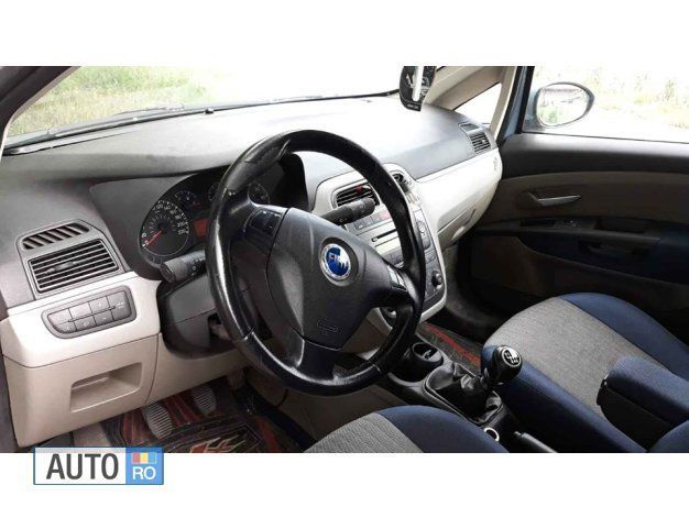 Second-hand Fiat Grande Punto 90 CP (66 kW) 2006 Albastru Hatchback