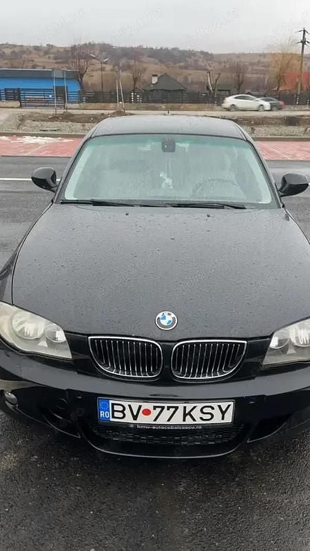 Negru Second-hand 2010 BMW 118 Hatchback | 4.499 EUR (Preț OK) - Imagine 1/4