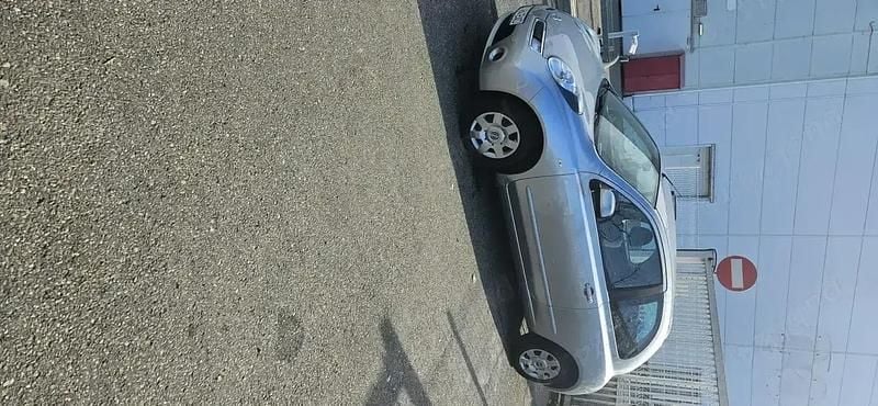 Second-hand Nissan Micra 65 CP (47 kW) 2010 Argintiu Berlinǎ