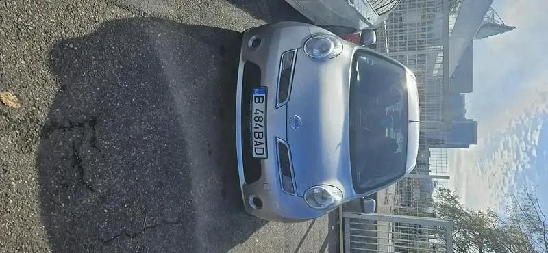 Second-hand Nissan Micra 65 CP (47 kW) 2010 Argintiu Berlinǎ