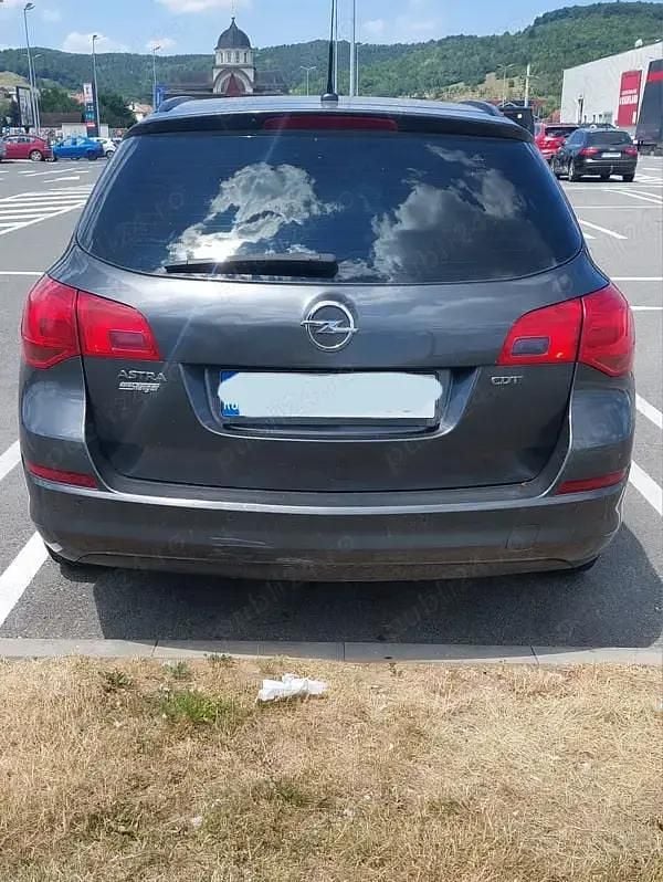 Gri Utilizat 2011 Opel Astra Break | 3.300 EUR (Preț OK) - Imagine 1/4