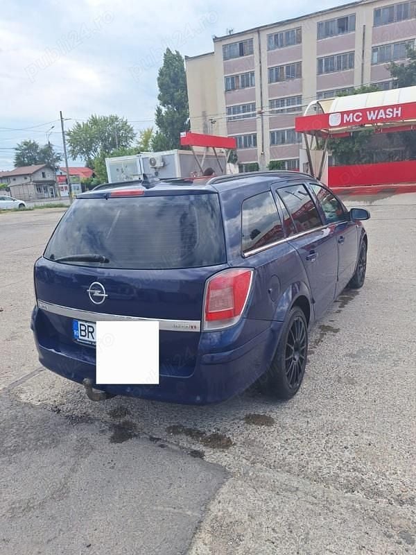 Second-hand Opel Astra 150 CP (110 kW) 2008 Albastru Monovolum