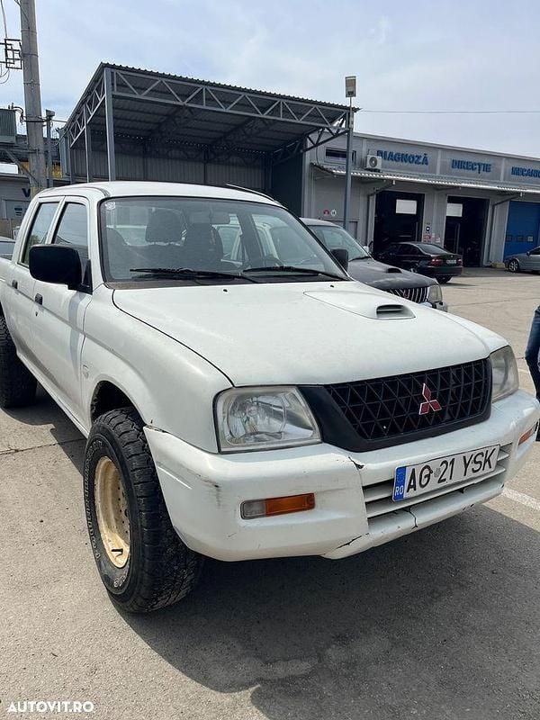 Alb Utilizat 2003 Mitsubishi L200 Pickup | 3.400 EUR - Imagine 1/4