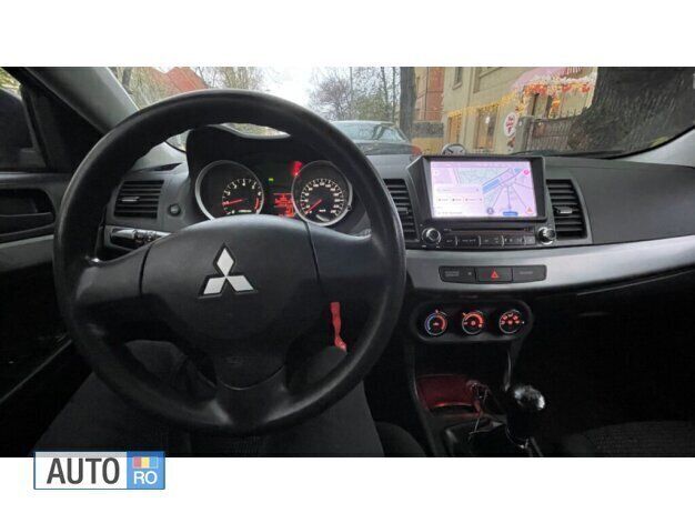 Second-hand Mitsubishi Lancer 117 CP (86 kW) 2011 Gri Berlinǎ