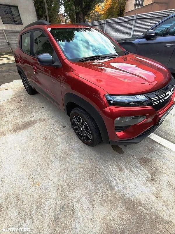 Culoareportocaliu Utilizat 2023 Dacia Spring Expression Hatchback | 11.200 EUR (Preț OK) - Imagine 1/4