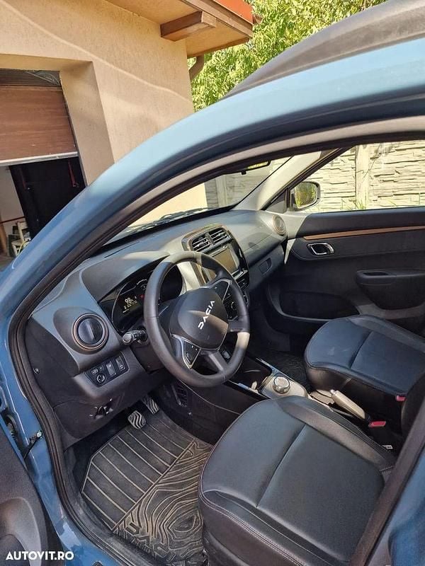Culoarealbastru Utilizat 2024 Dacia Spring Extreme Hatchback | 11.799 EUR (Preț OK) - Imagine 1/4