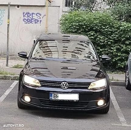 Culoarenegru Utilizat 2011 VW Jetta Comfortline Berlinǎ | 5.700 EUR (Preț OK) - Imagine 1/4