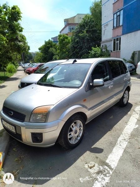 Gri Utilizat 2012 Ford Fusion Break | 3.999 EUR (Preț OK) - Imagine 1/4
