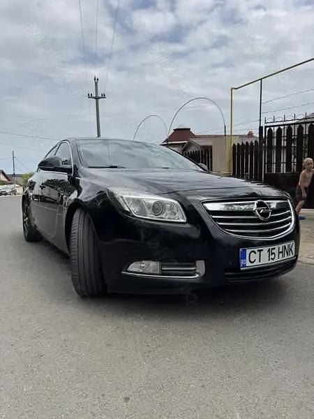 Second-hand Opel Insignia 131 CP (96 kW) 2011 Negru Berlinǎ