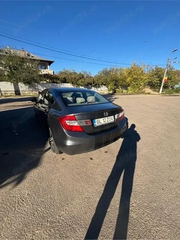 Second-hand Honda Civic 142 CP (104 kW) 2015 Gri Berlinǎ