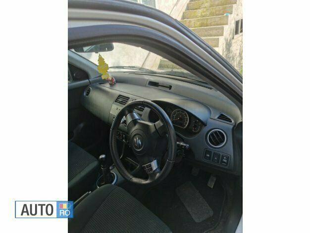 Second-hand Suzuki Swift 70 CP (51 kW) 2010 Gri Hatchback