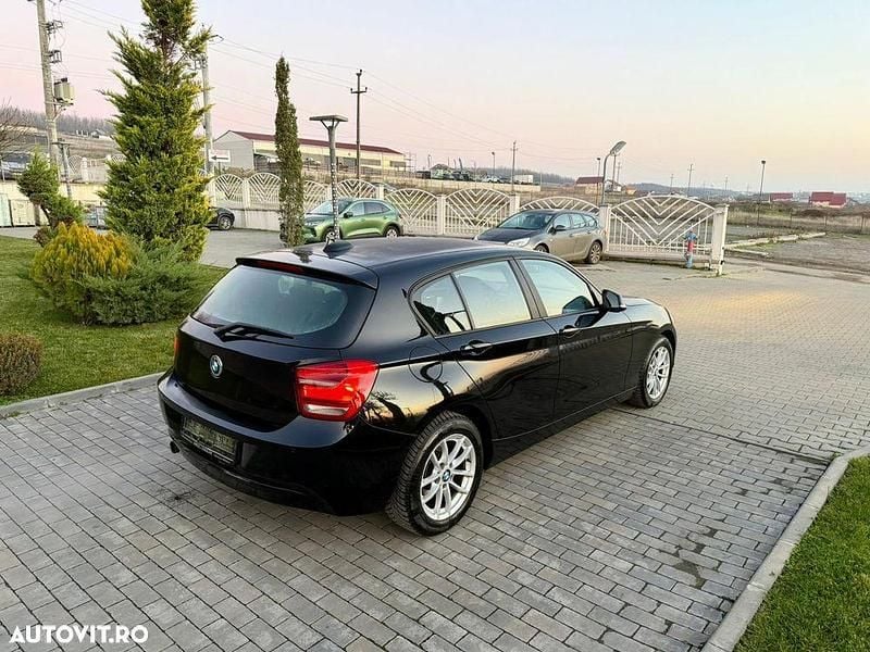 Second-hand BMW 116 136 CP (100 kW) 2013 Culoarenegru Hatchback