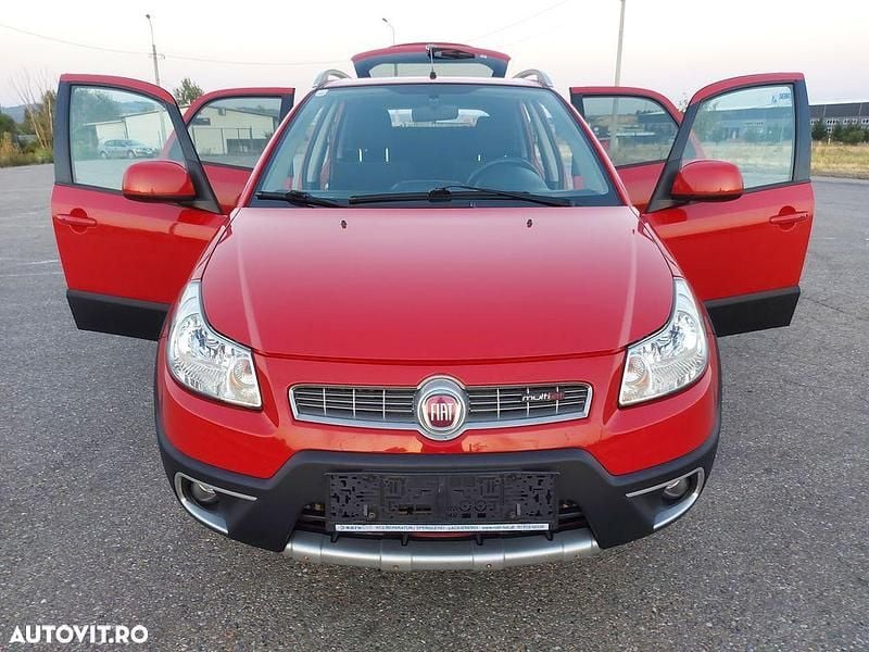 Culoarerosu Utilizat 2009 Fiat Sedici SUV | 3.990 EUR - Imagine 1/4