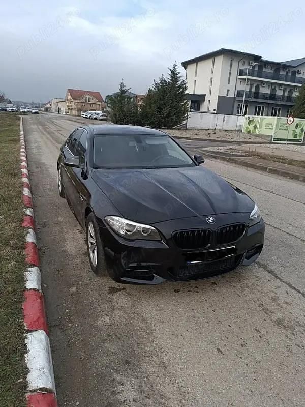 Second-hand BMW 520 190 CP (139 kW) 2014 Negru Berlinǎ