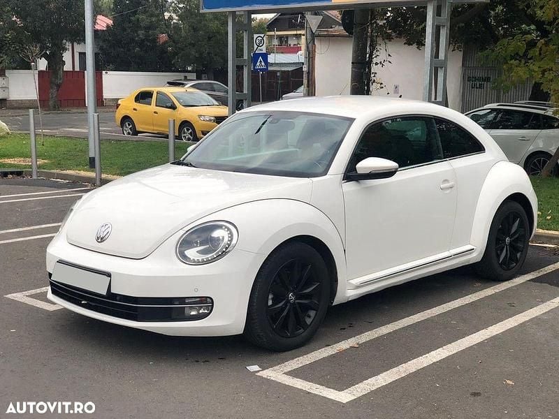 Culoarealb Utilizat 2012 VW Beetle Coupe | 6.999 EUR (Preț OK) - Imagine 1/4