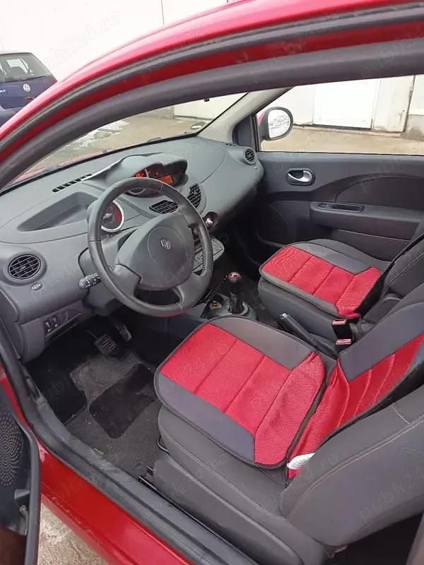 Second-hand Renault Twingo 57 CP (41 kW) 2009 Rosu Hatchback