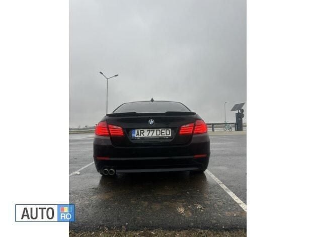 Second-hand BMW 520 Sport Line 184 CP (135 kW) 2012 Negru Berlinǎ