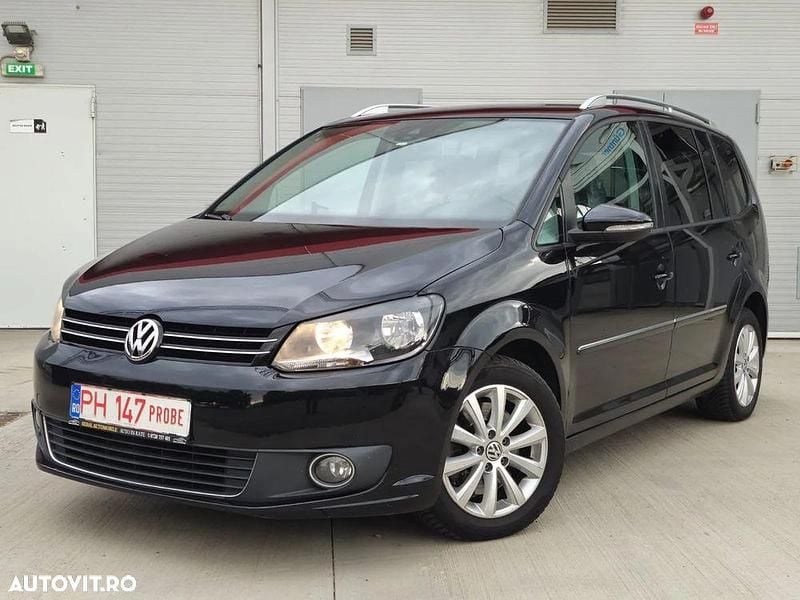 Culoarenegru Utilizat 2013 VW Touran Highline Monovolum | 6.690 EUR (Super Preț) - Imagine 1/4