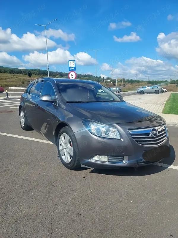 Second-hand Opel Insignia Sport 160 CP (117 kW) 2010 Gri Break