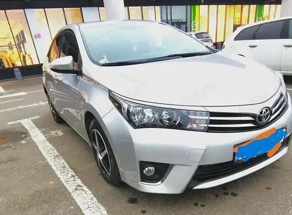 Second-hand Toyota Corolla 132 CP (97 kW) 2016 Argintiu Berlinǎ
