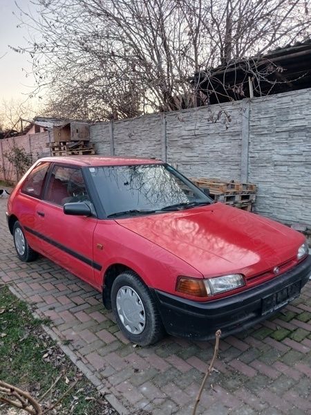 Rosu Utilizat 1996 Mazda 323 Hatchback | 2.000 EUR - Imagine 1/4