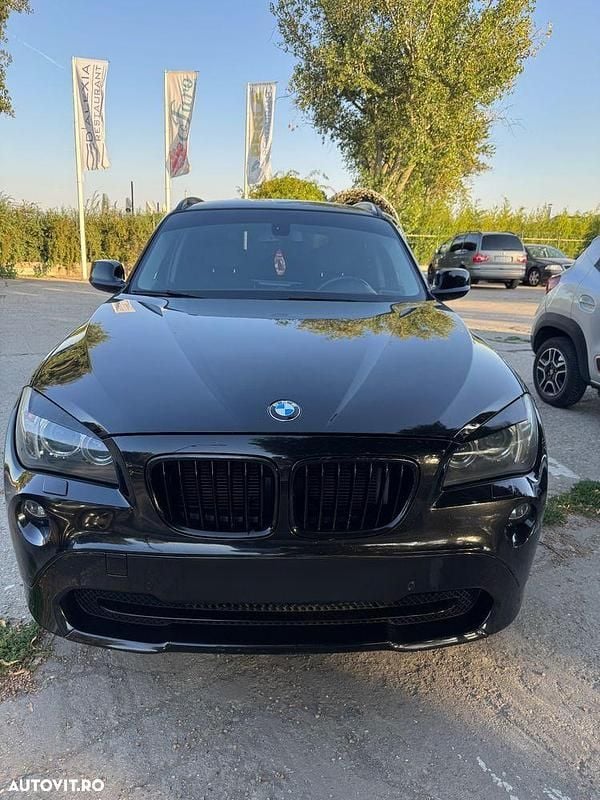 Culoarenegru Utilizat 2011 BMW X1 SUV | 7.999 EUR (Super Preț) - Imagine 1/4