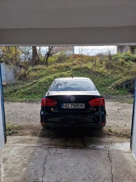 Second-hand VW Jetta 105 CP (77 kW) 2013 Negru Berlinǎ