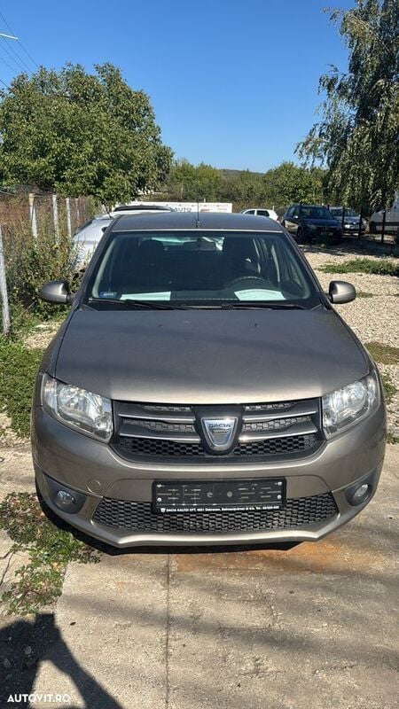 Galbeuriu Utilizat 2014 Dacia Sandero Comfort Hatchback | 4.380 EUR (Preț bun) - Imagine 1/4