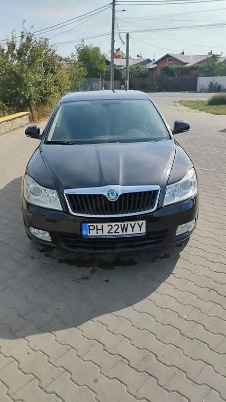Culoarenegru Utilizat 2012 Skoda Octavia Ambiente Berlinǎ | 5.300 EUR (Preț OK) - Imagine 1/4