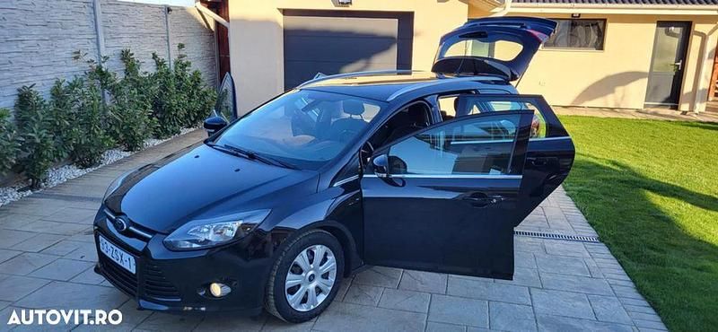 Negru Utilizat 2014 Ford Focus Titanium X Break | 4.499 EUR (Preț bun) - Imagine 1/4