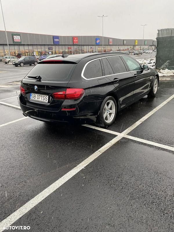 Second-hand BMW 520 Luxury Line 190 CP (139 kW) 2014 Culoarenegru Break