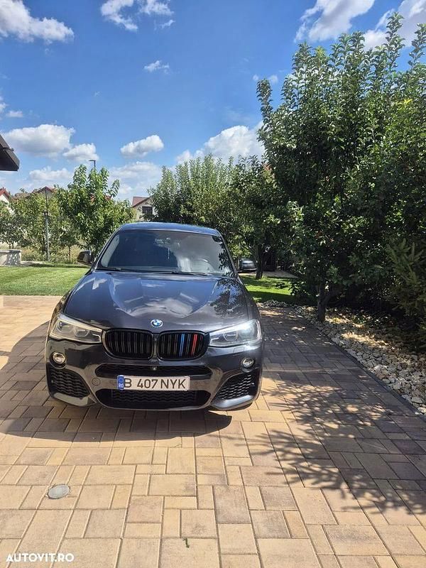 Culoarenegru Utilizat 2018 BMW X4 M Sport SUV | 28.750 EUR (Preț OK) - Imagine 1/4