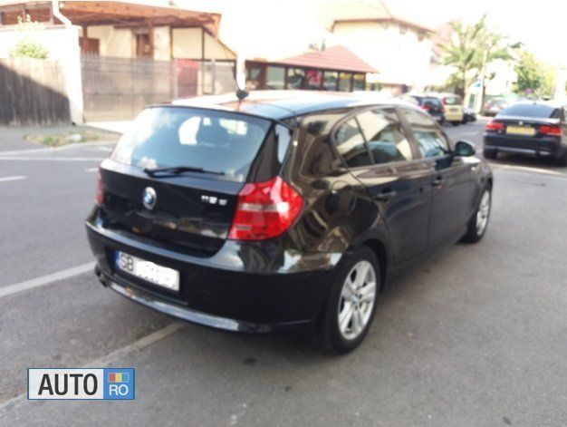 Second-hand BMW 118 143 CP (105 kW) 2009 Negru Hatchback