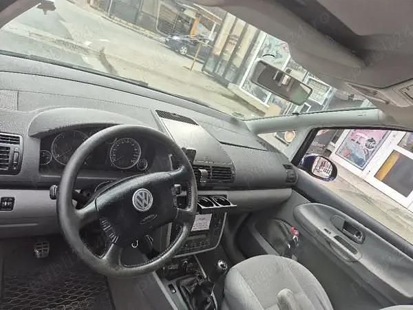 Second-hand VW Sharan 131 CP (96 kW) 2006 Albastru Monovolum