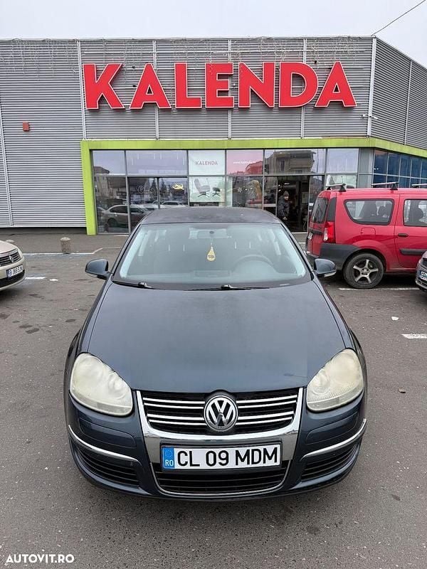 Culoarenegru Utilizat 2008 VW Jetta Sportline Break | 899 EUR (Preț bun) - Imagine 1/4