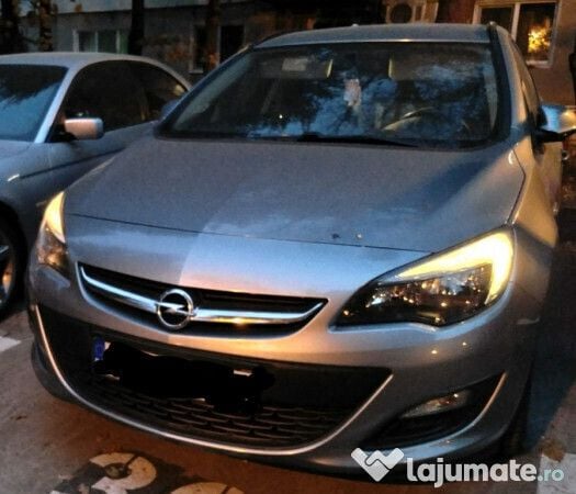 Gri Second-hand 2014 Opel Astra Break | 5.500 EUR - Imagine 1/4