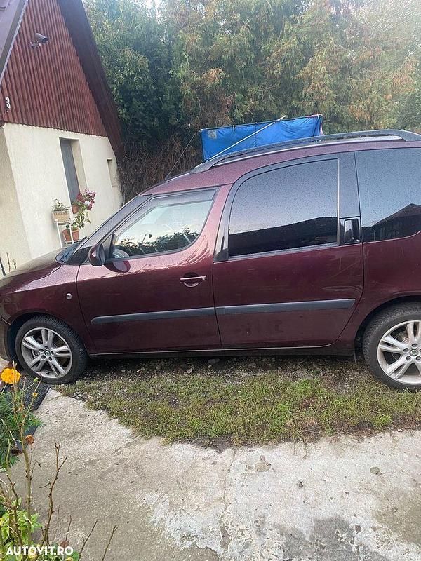 Second-hand Skoda Roomster Style 105 CP (77 kW) 2009 Culoarerosu Monovolum