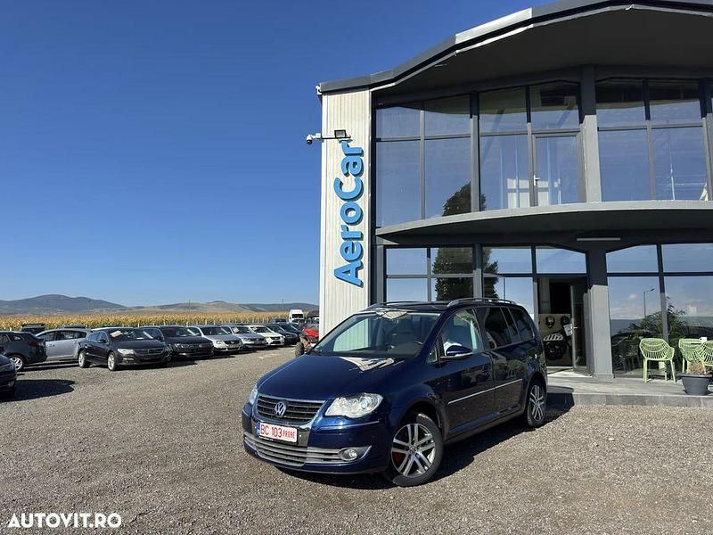 Culoarealbastru Utilizat 2010 VW Touran Highline Monovolum | 3.990 EUR (Super Preț) - Imagine 1/4