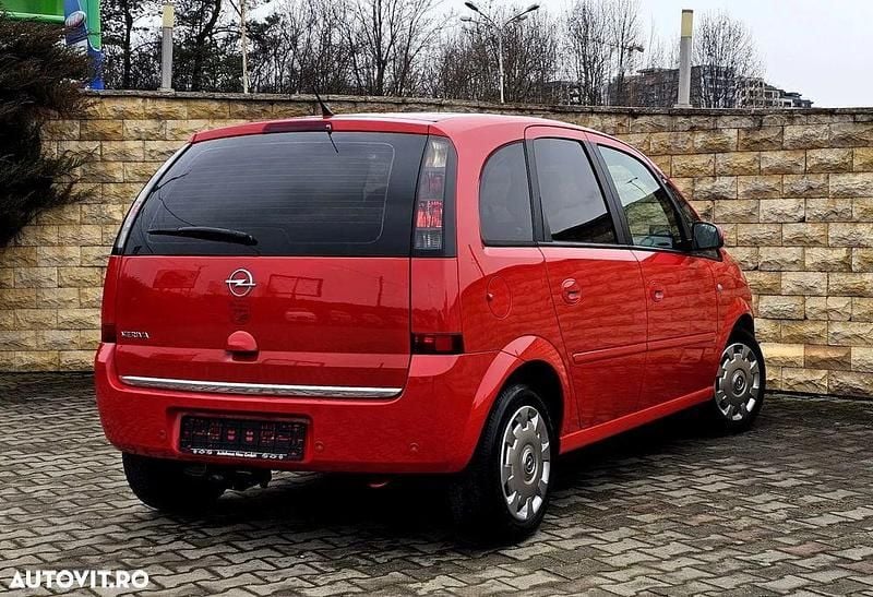 Second-hand Opel Meriva 100 CP (73 kW) 2009 Culoarerosu Monovolum