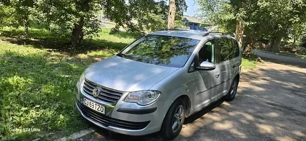 Second-hand VW Touran 104 CP (76 kW) 2010 Argintiu Monovolum