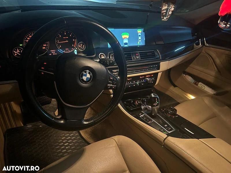 Second-hand BMW 520 184 CP (135 kW) 2012 Culoarenegru Berlinǎ