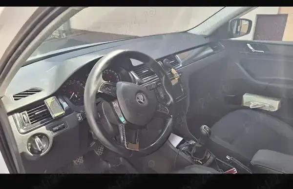 Second-hand Skoda Rapid Active 105 CP (77 kW) 2014 Alb Berlinǎ